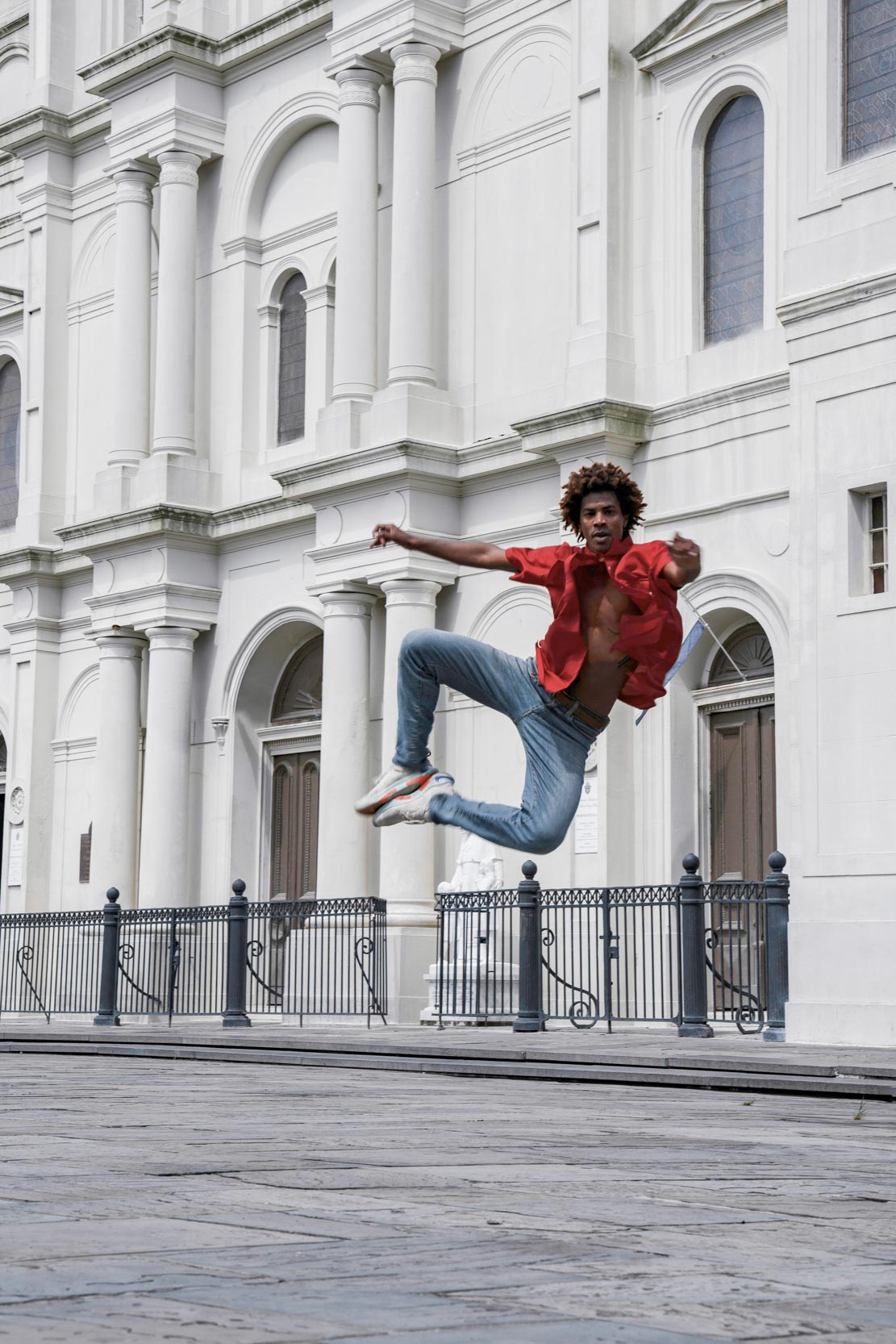 Dancer performing in front of French Quarter cathedral in New Orleans