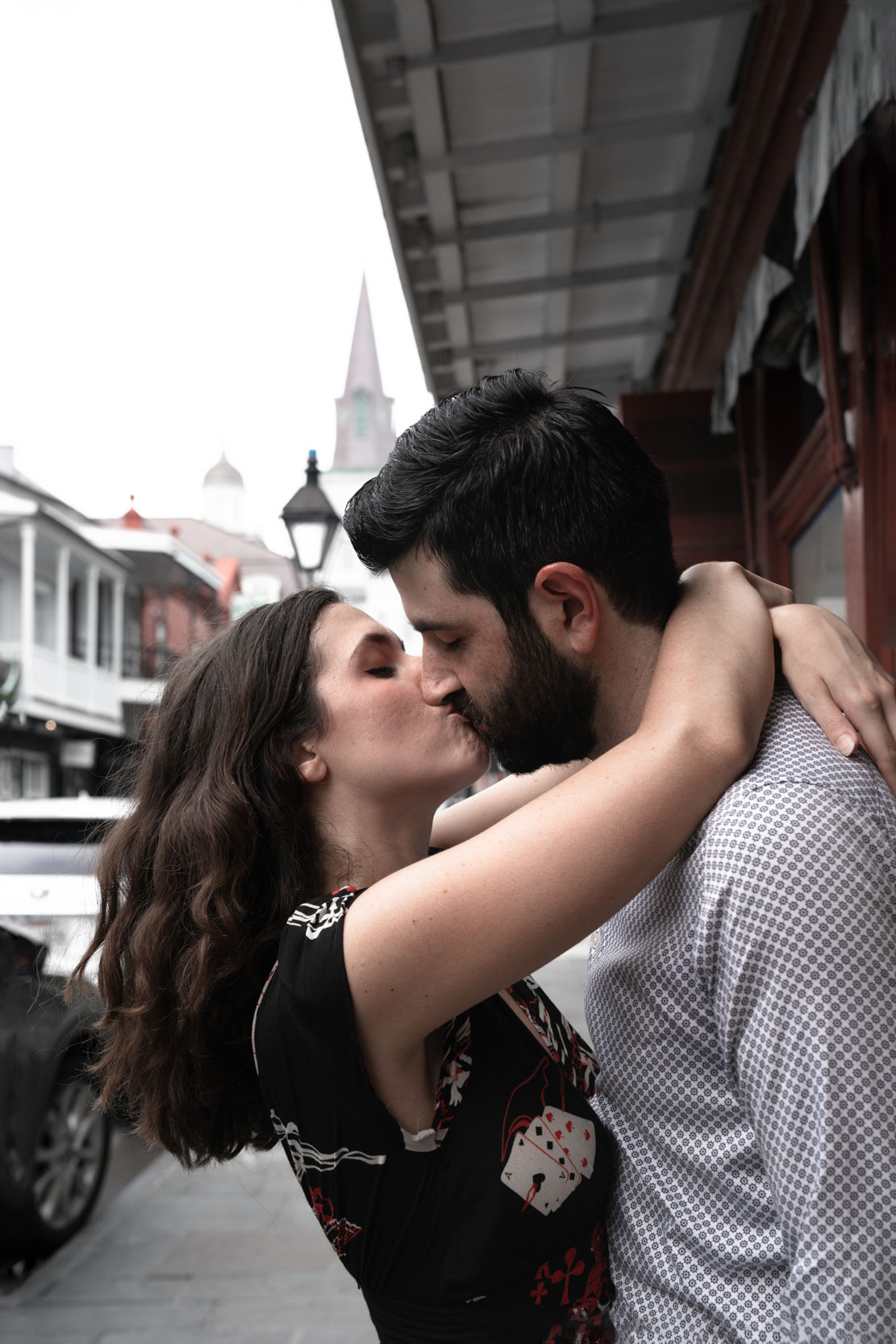 Romantic couple kissing and falling in love in the New Orleans French Quarter