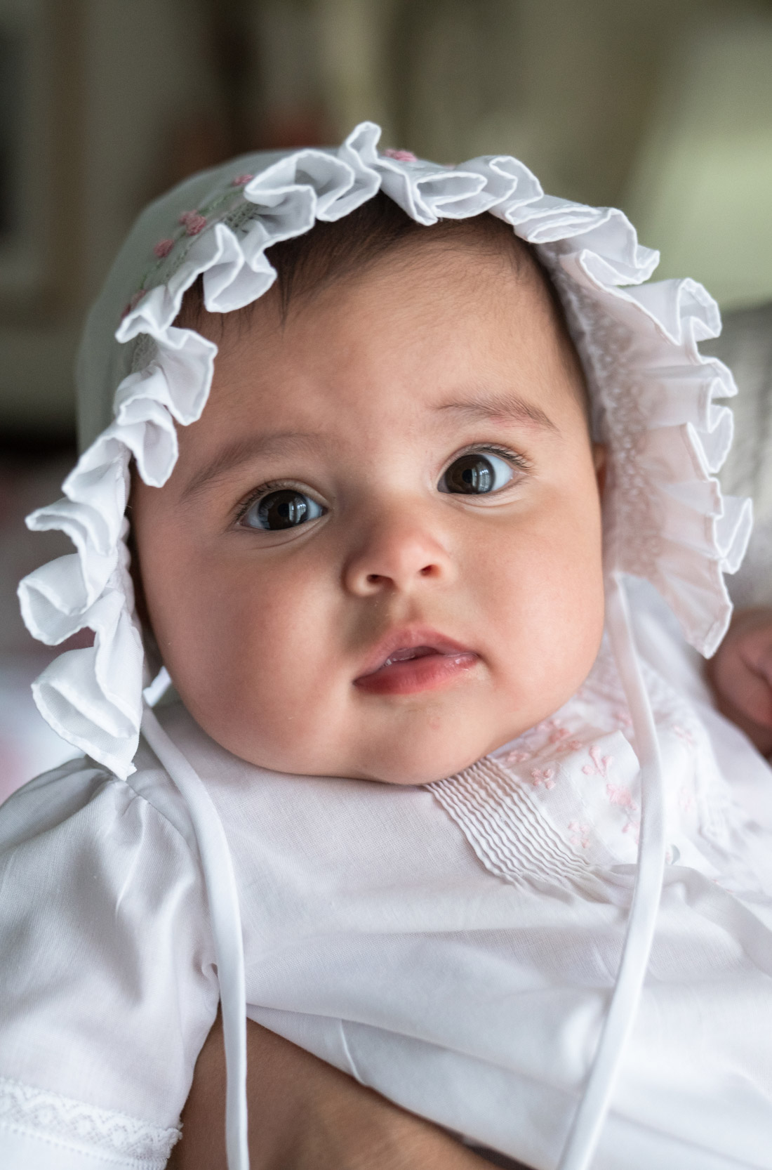 Cute baby wearing bonnet for portrait