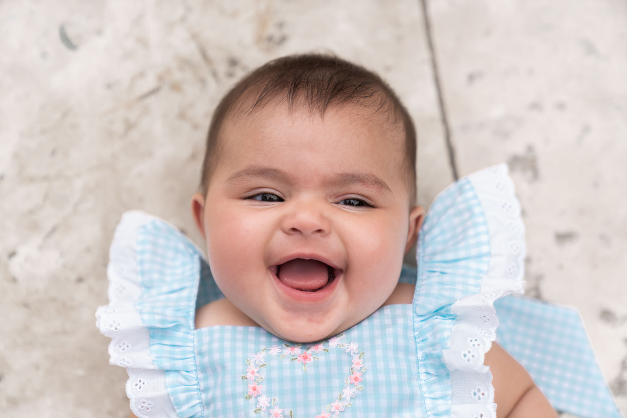 Baby laughing and smiling