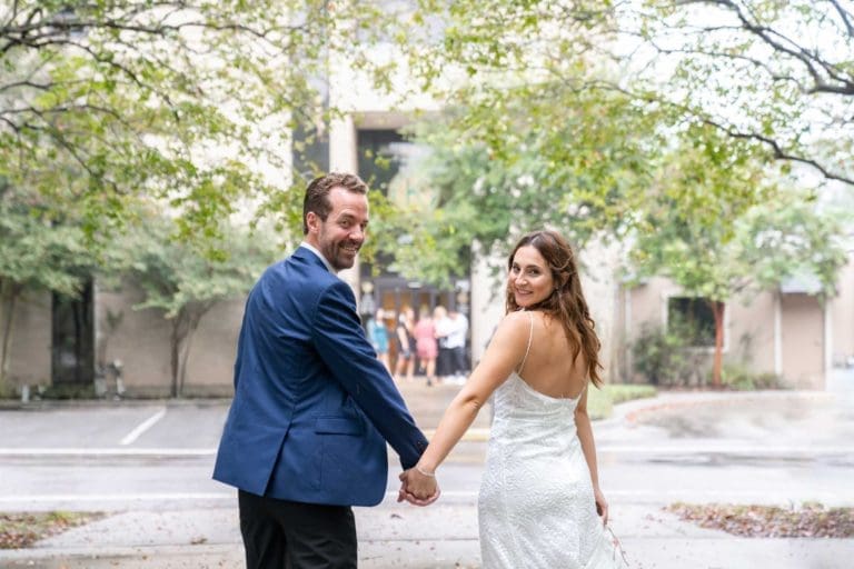 Bride and groom just married and smiling on their wedding day