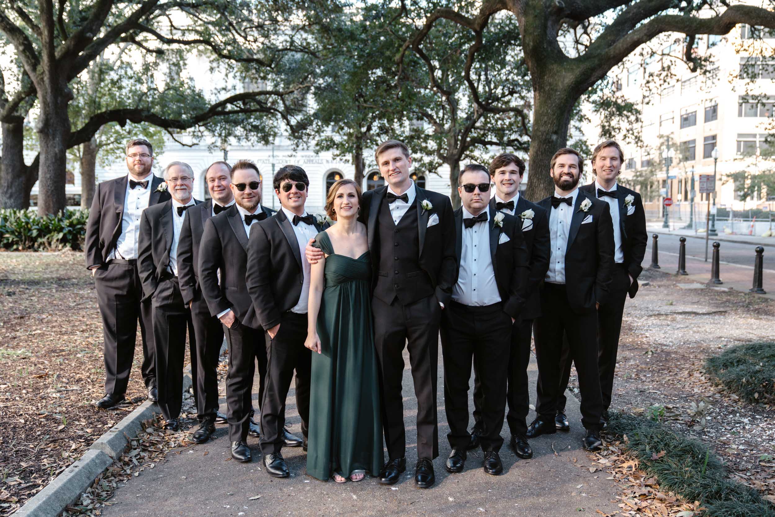 groom and groomsmen at Lafayette Square Park in New Orleans