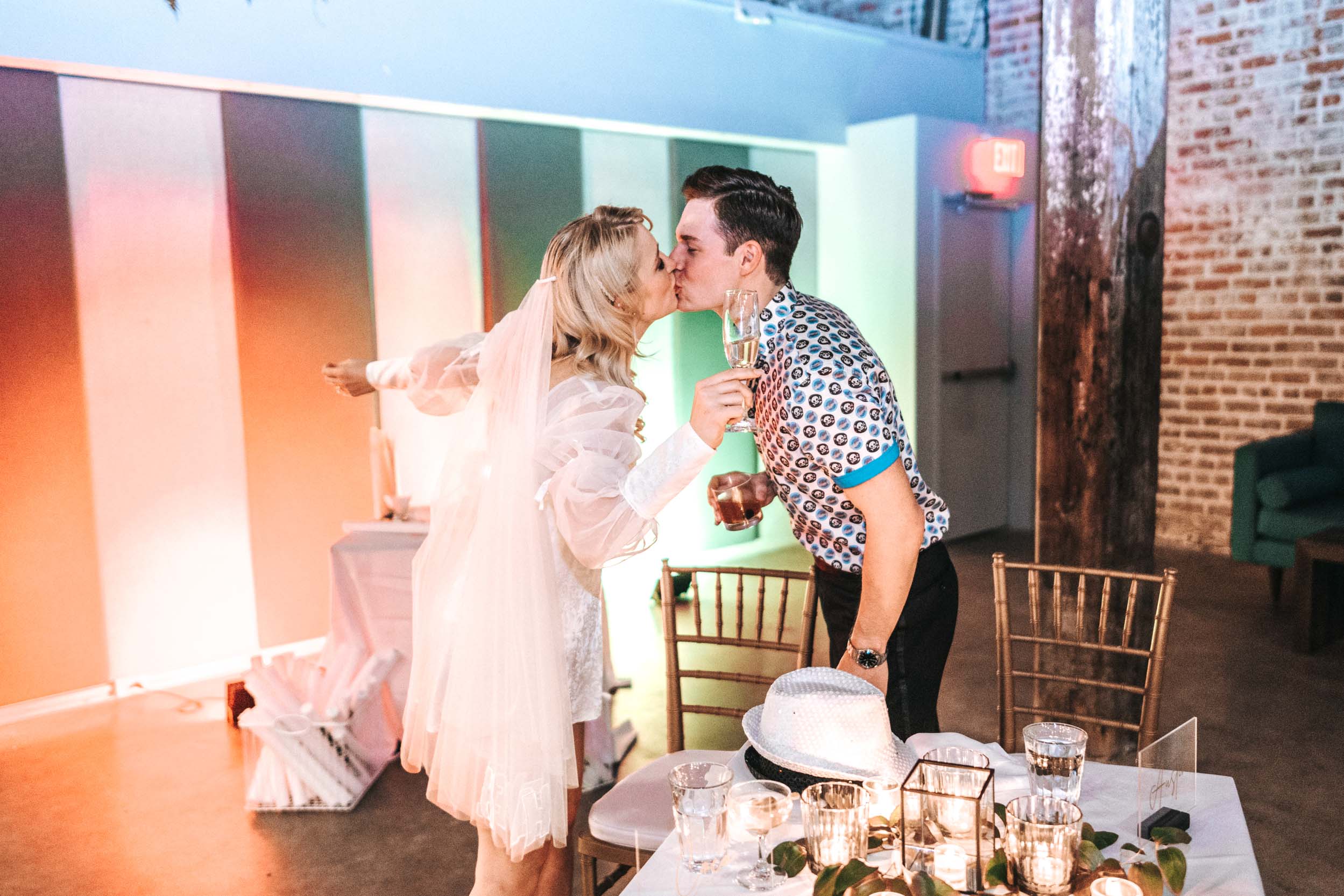 bride and groom kissing during reception at Capulet in New Orleans