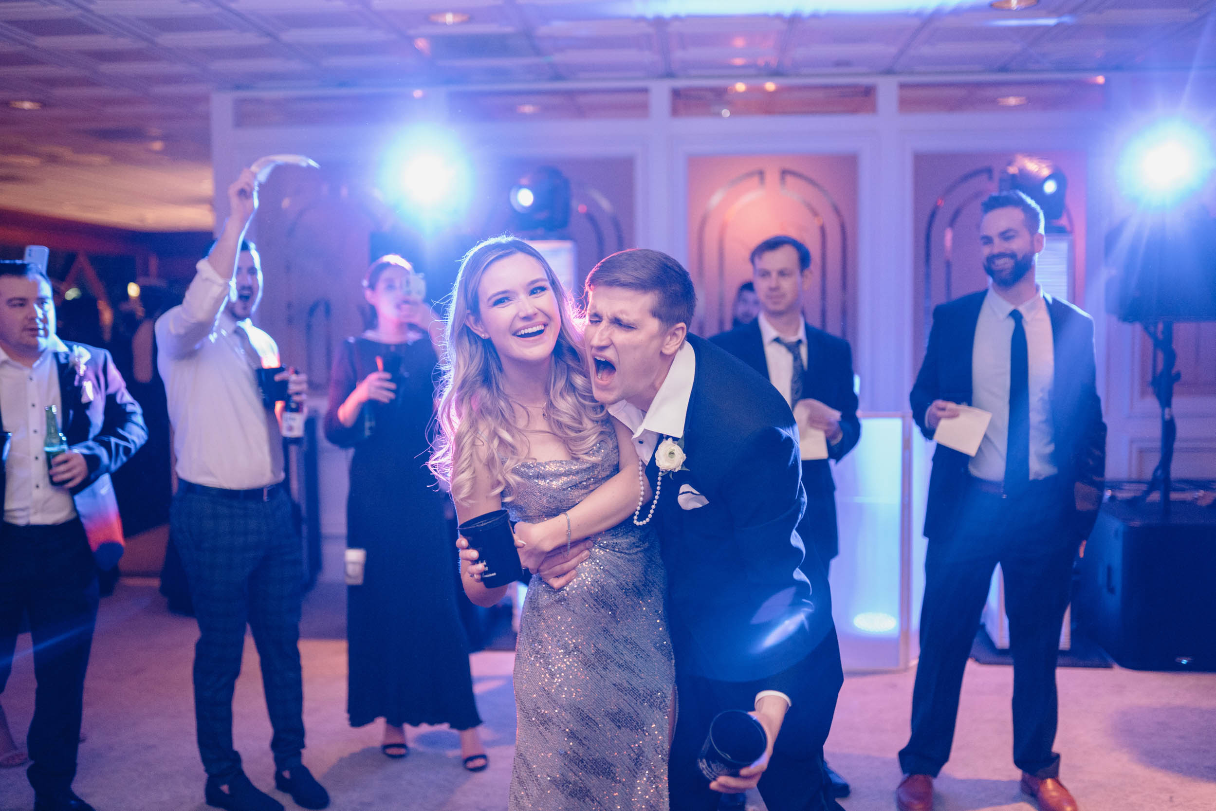 bride and groom celebrating during wedding reception at the Riverview Room in New Orleans