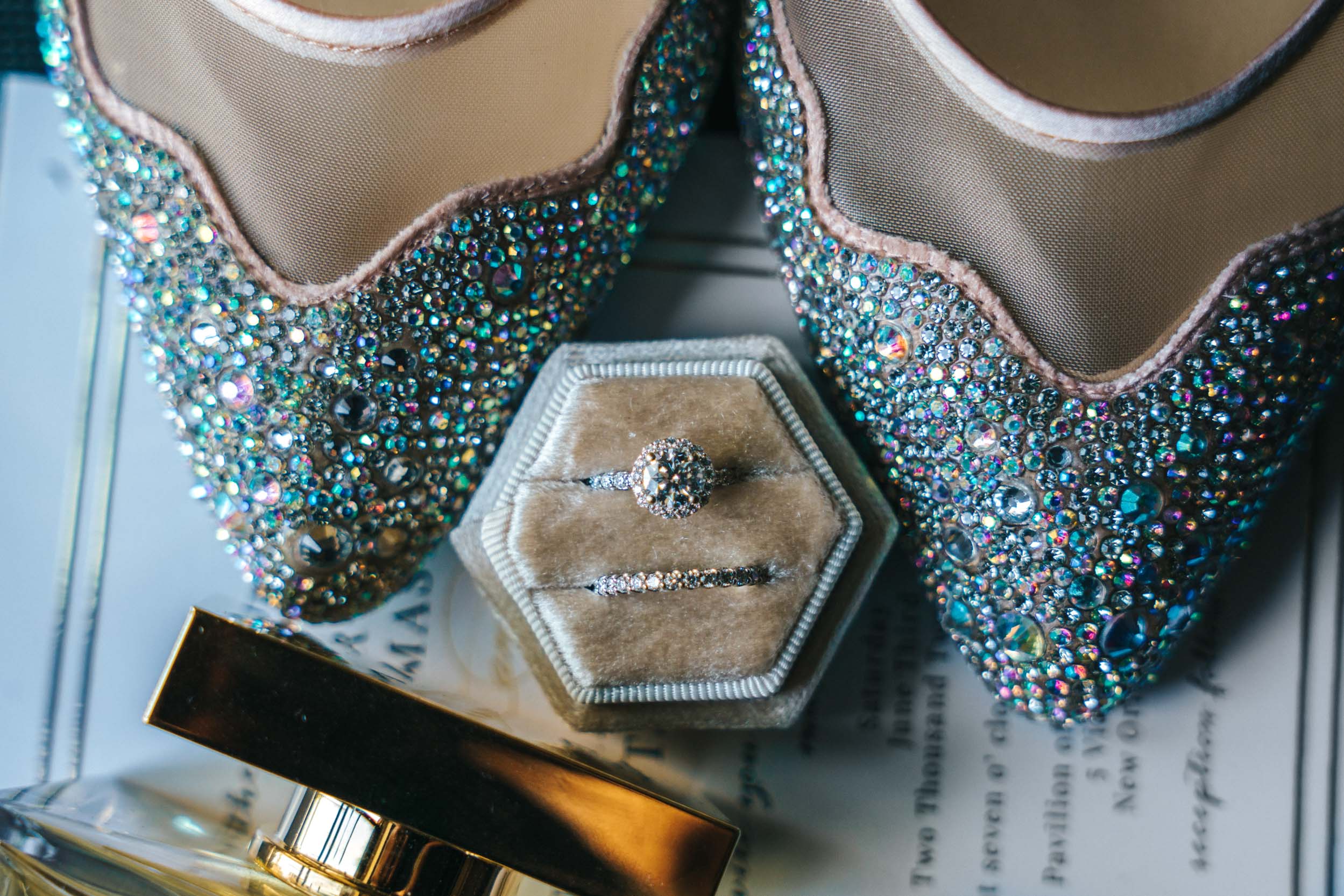 bridal details with beaded bridal shoes, rings and perfume